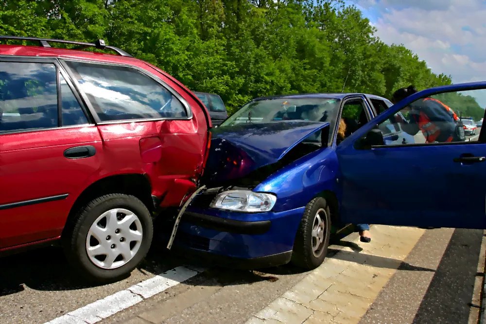 Blue car that rear ened a red car.